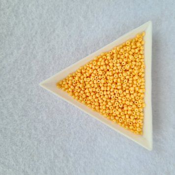 03182 Чеський бісер Preciosa 10/0 жовто-помаранчевий крейдяний сольгель 03182 фото