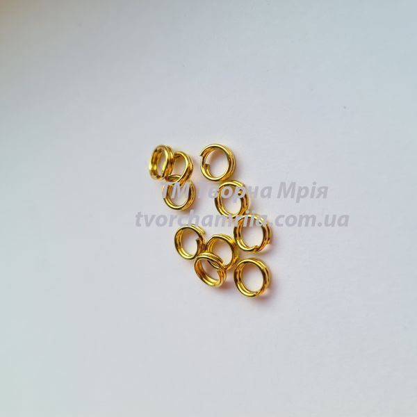 Кільця одинарні металеві золоті 6 мм 000001066 фото
