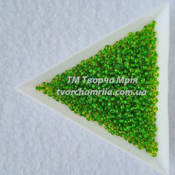 81058 Чешский бисер Preciosa 10/0 зеленый прозрачный с прорисованной серединкой 81058 фото