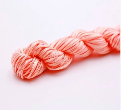 Нейлоновий шнур для плетіння браслетів 1 мм персиковий 1 метр 000001696 фото