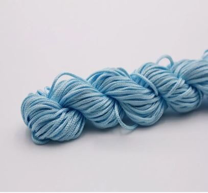 Нейлоновий шнур для плетіння браслетів 1 мм блакитний  1 метр 000001697 фото
