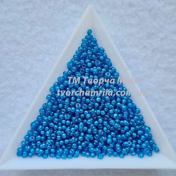 65157 Чешский бисер Preciosa 10/0 голубой прозрачный с прорисованной серединкой 65157 фото
