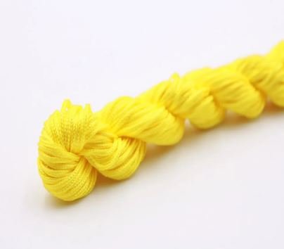 Нейлоновий шнур для плетіння браслетів 1 мм жовтий  1 метр 000001698 фото