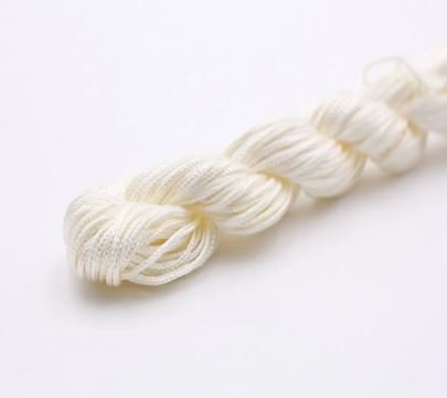 Нейлоновий шнур для плетіння браслетів 1 мм айворі 1 метр 000001708 фото